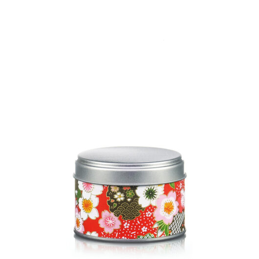 Petite boite à thé rouge aux motifs de fleurs stylisées