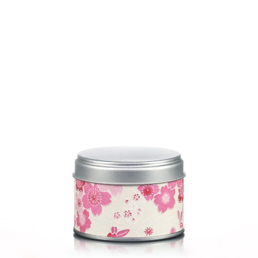 Petite boite à thé crème aux motifs de fleurs roses