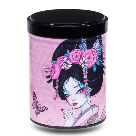 Boite a the en metal d'artiste illustrée d'un dessin d'une geisha japonaise et de papillons sur fond rose