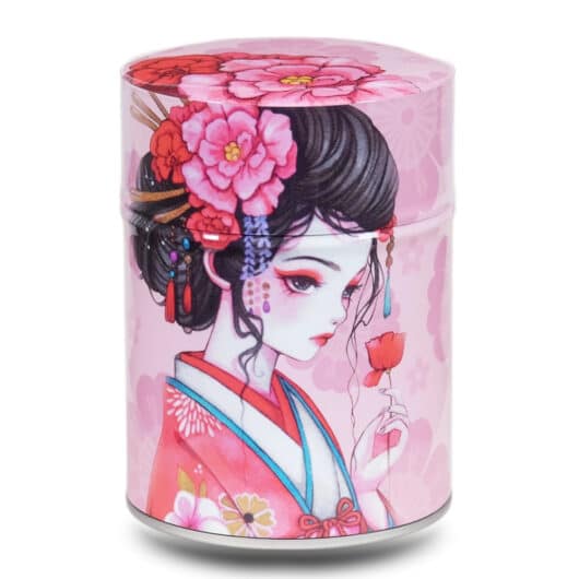 Boite à thé en métal illustrée d'une geisha japonaise avec une fleur rouge sur fond rose