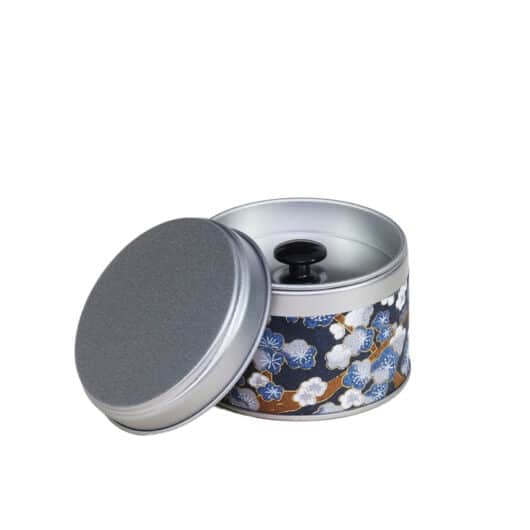 small metal travel tea box covered with washi paper - open