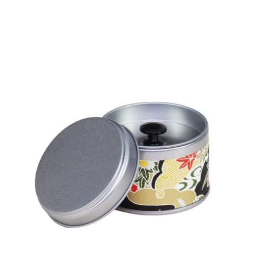 small metal travel tea box covered with washi paper - open