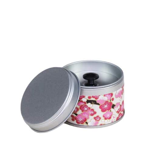 small metal travel tea box covered with washi paper - open