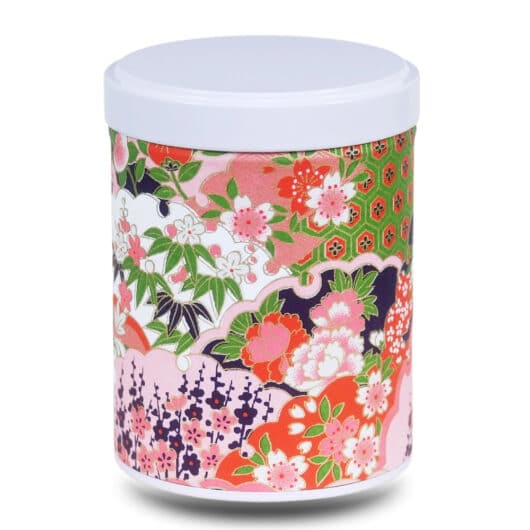 Pink washi paper tea box with stylized landscape