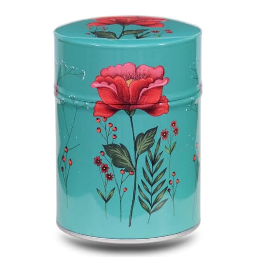 Boite à thé en métal illustrée d'un dessin de fleur rouge sur fond turquoise